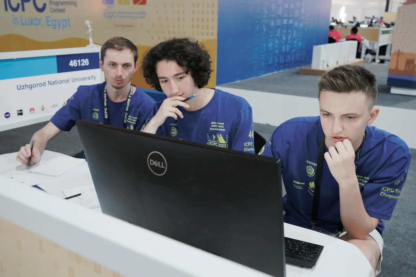 The Uzhhorod National University team working together at their ICPC contest workstation